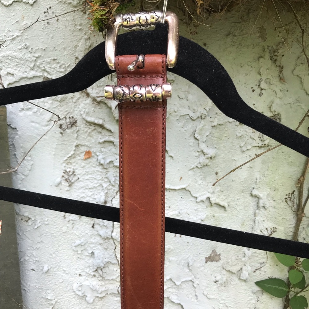 Brown leather belt.
